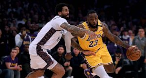 LOS ANGELES, CALIFORNIA - MARCH 10: LeBron James #23 of the Los Angeles Lakers drives to the basket past Wilson Chandler #21 of the Brooklyn Nets during a 104-102 Nets win at Staples Center on March 10, 2020 in Los Angeles, California.