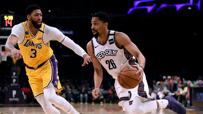 LOS ANGELES, CALIFORNIA - MARCH 10: Spencer Dinwiddie #26 of the Brooklyn Nets drives to the basket on Anthony Davis #3 of the Los Angeles Lakers during the first half at Staples Center on March 10, 2020 in Los Angeles, California.
