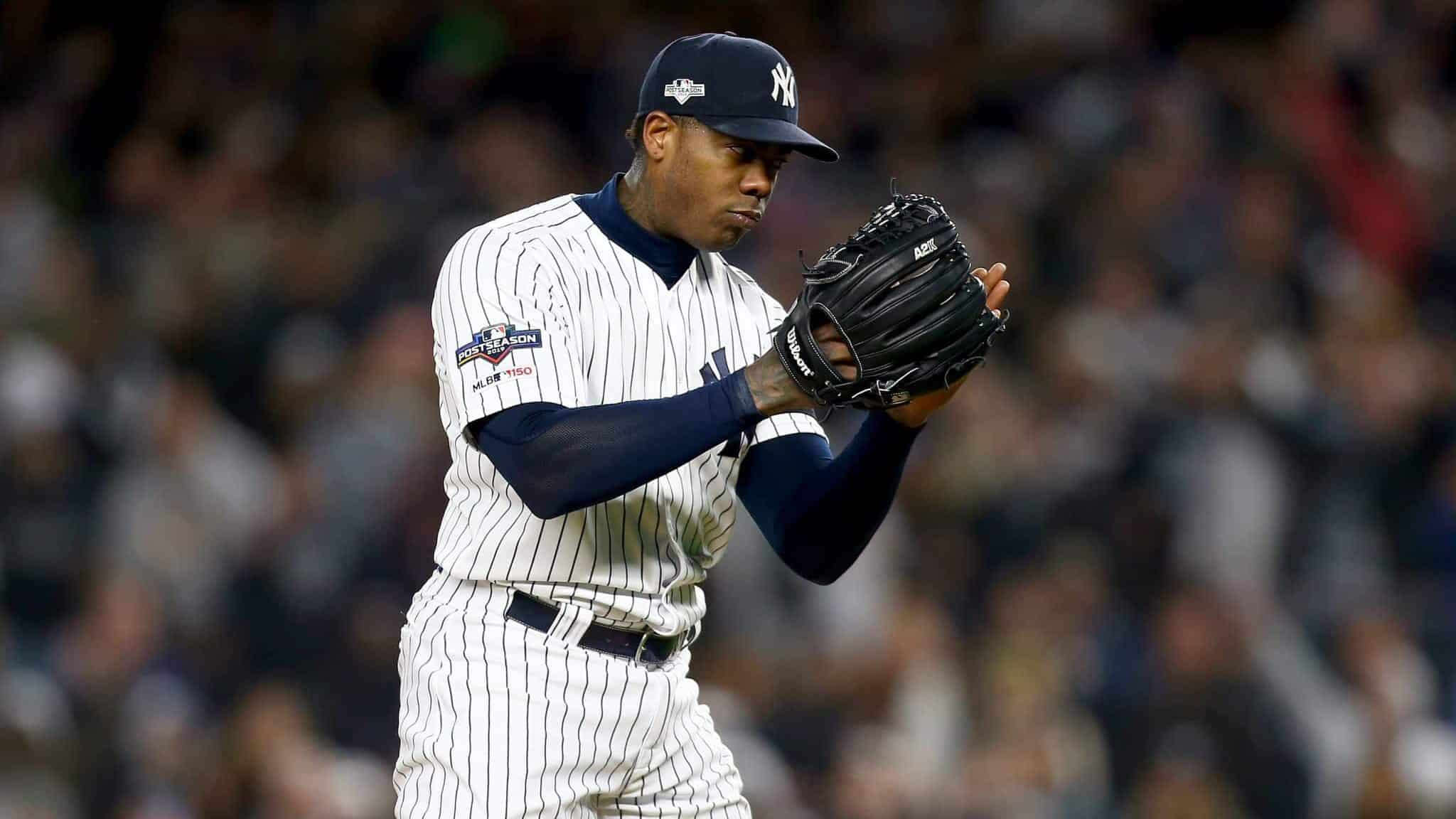 NEW YORK, NEW YORK - OCTOBER 18: Aroldis Chapman #54 of the New York Yankees looks on against the Houston Astros during the ninth inning in game five of the American League Championship Series at Yankee Stadium on October 18, 2019 in New York City.