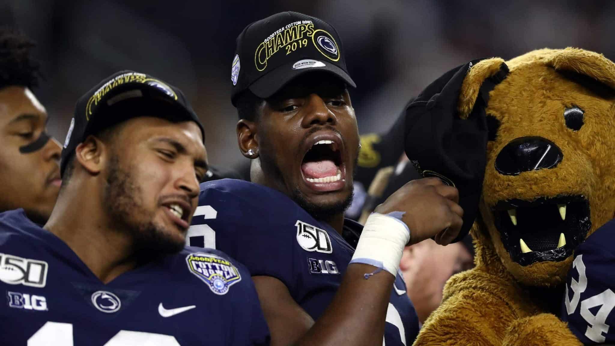 ARLINGTON, TEXAS - DECEMBER 28: Cam Brown #6 of the Penn State Nittany Lions celebrates after a 53-39 win in the Goodyear Cotton Bowl Classic against the Memphis Tigers at AT&T Stadium on December 28, 2019 in Arlington, Texas.
