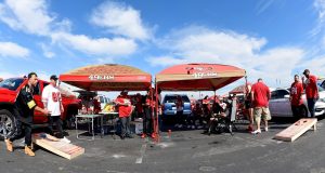 SANTA CLARA, CA - SEPTEMBER 22: San Francisco 49ers fans tailgating and playing the game Cornhole in the parking lot prior to the start of an NFL football game against the Pittsburgh Steelers at Levi's Stadium on September 22, 2019 in Santa Clara, California.