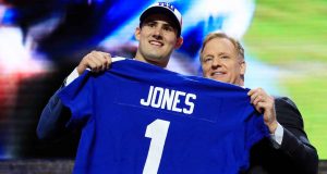 NASHVILLE, TENNESSEE - APRIL 25: Daniel Jones of Duke poses with NFL Commissioner Roger Goodell after being chosen #6 overall by the New York Giants during the first round of the 2019 NFL Draft on April 25, 2019 in Nashville, Tennessee.