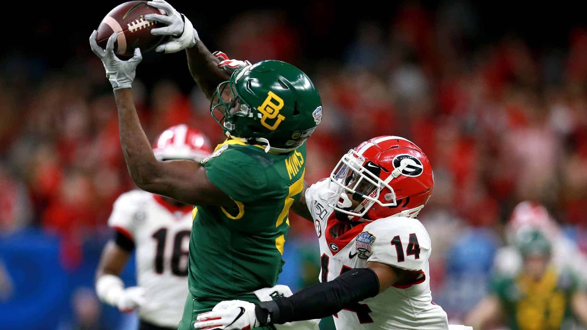 NEW ORLEANS, LOUISIANA - JANUARY 01: Denzel Mims #5 of the Baylor Bears catches a pass over DJ Daniel #14 of the Georgia Bulldogs during the Allstate Sugar Bowl at Mercedes Benz Superdome on January 01, 2020 in New Orleans, Louisiana.