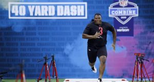 INDIANAPOLIS, IN - FEBRUARY 29: Defensive lineman Derrick Brown of Auburn runs the 40-yard dash during the NFL Combine at Lucas Oil Stadium on February 29, 2020 in Indianapolis, Indiana.
