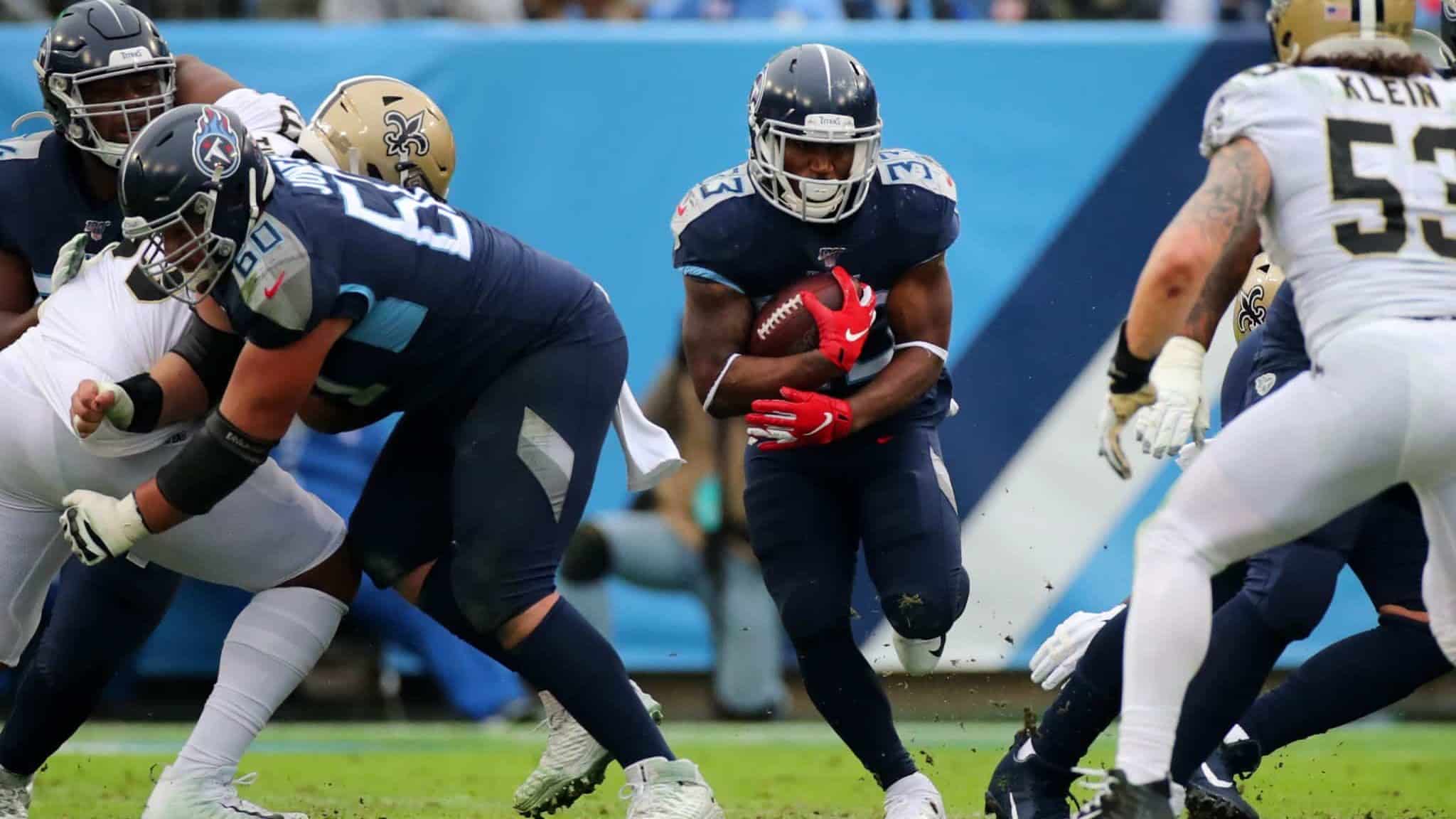 NASHVILLE, TENNESSEE - DECEMBER 22: Running back Dion Lewis #33 of the Tennessee Titans carries the ball in the second quarter against the New Orleans Saints at Nissan Stadium on December 22, 2019 in Nashville, Tennessee.