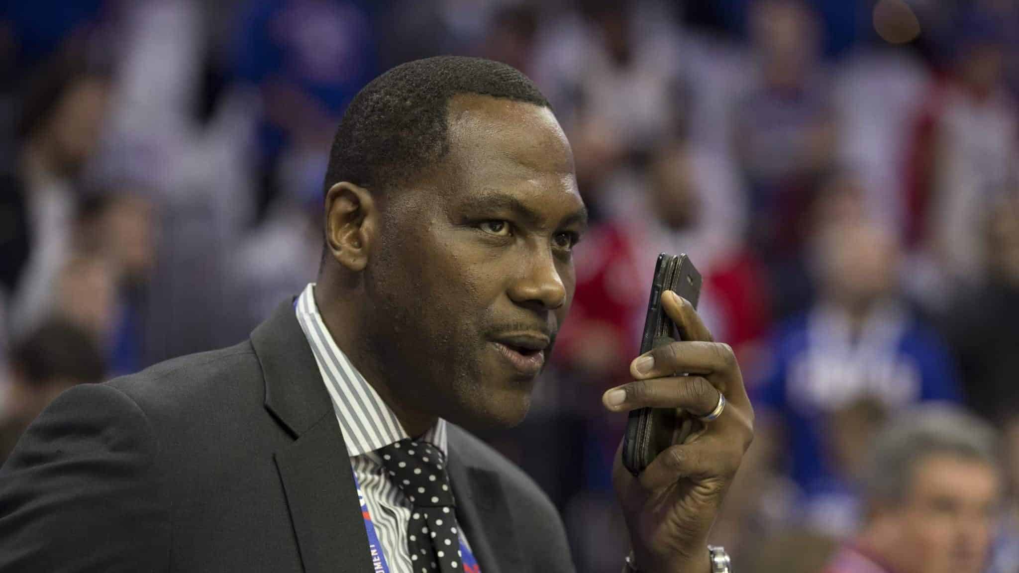 PHILADELPHIA, PA - OCTOBER 18: General Manager Elton Brand of the Philadelphia 76ers talks on the phone prior to the game against the Chicago Bulls at Wells Fargo Center on October 18, 2018 in Philadelphia, Pennsylvania. NOTE TO USER: User expressly acknowledges and agrees that, by downloading and or using this photograph, User is consenting to the terms and conditions of the Getty Images License Agreement.