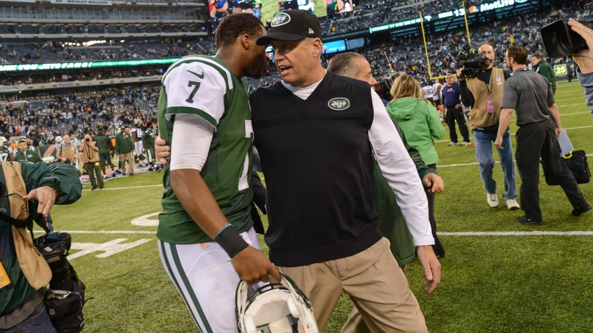 EAST RUTHERFORD, NJ - DECEMBER 22: Head coach Rex Ryan of the New York Jets and quarterback Geno Smith #7 of the New York Jets walk off together at the end of the game against the Cleveland Browns at MetLife Stadium on December 22, 2013 in East Rutherford, New Jersey.