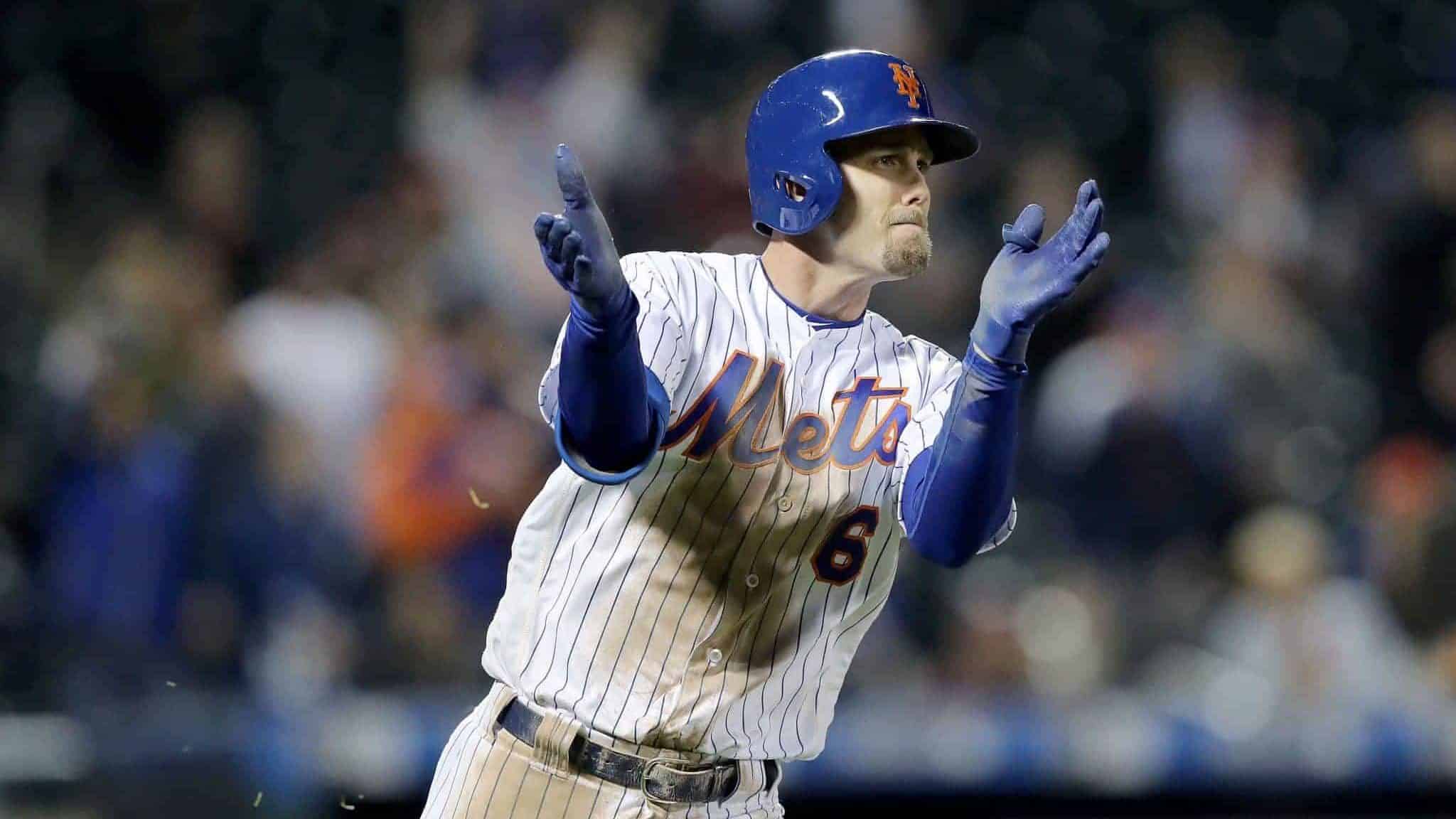 NEW YORK, NEW YORK - APRIL 30: Jeff McNeil #6 of the New York Mets celebrates his single in the 10th inning against the Cincinnati Reds at Citi Field on April 30, 2019 in Flushing neighborhood of the Queens borough of New York City.The New York Mets defeated the Cincinnati Reds 4-3 in 10 innings.