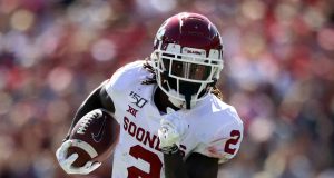 DALLAS, TEXAS - OCTOBER 12: CeeDee Lamb #2 of the Oklahoma Sooners runs the ball against the Texas Longhorns in the second quarter during the 2019 AT&T Red River Showdown at Cotton Bowl on October 12, 2019 in Dallas, Texas.