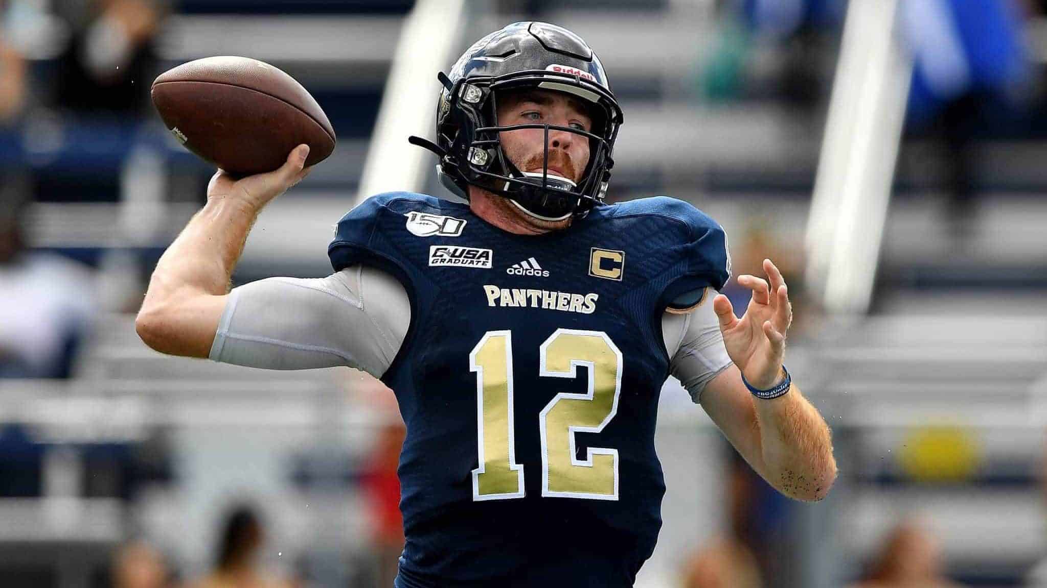 MIAMI, FLORIDA - NOVEMBER 02: James Morgan #12 of the FIU Golden Panthers looks to pass against the Old Dominion Monarchs in the first half at Ricardo Silva Stadium on November 02, 2019 in Miami, Florida. New York Jets