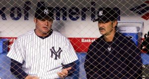BRONX, NY - MAY 10: Jason Giambi #25 of the New York Yankees speaks with the Yankees Hitting Coach Don Mattingly in the dugout during the Yankees game against the Seattle Mariners at Yankee Stadium on May 10, 2005 in Bronx, New York.