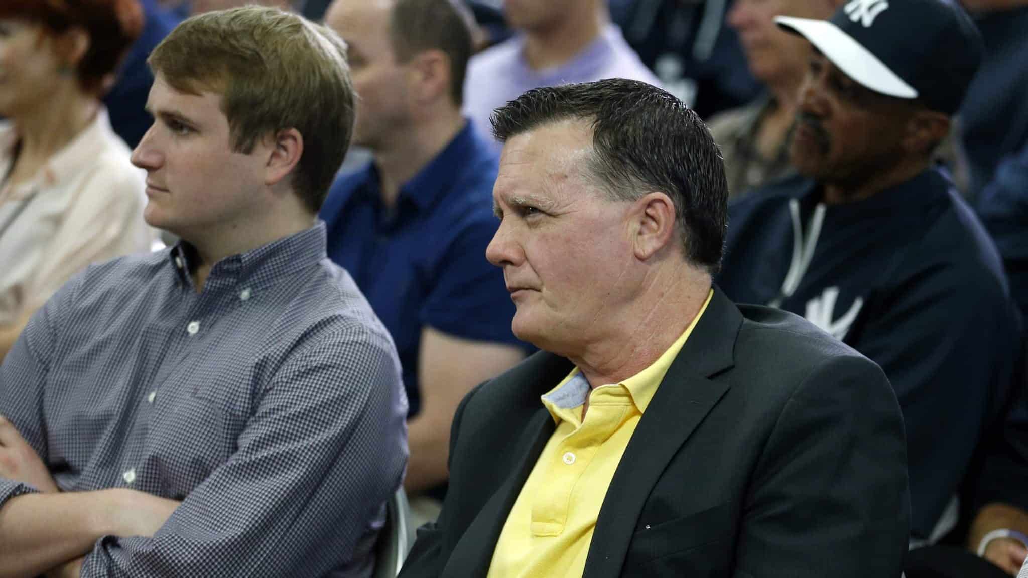 TAMPA, FL - FEBRUARY 19: Hank Steinbrenner, General Partner and Co-Chairperson of the New York Yankees watches as Derek Jeter speaks at a media availability after announcing that the 2014 season will be his last before retiring at George M. Steinbrenner Field on February 19, 2014 in Tampa, Florida.