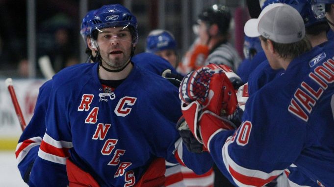 NEW YORK - MARCH 25: Jaromir Jagr #68 of the New York Rangers is congratulated by team mates after scoring a goal against the Philadelphia Flyers during their game on March 25, 2008 at Madison Square Garden in New York City.