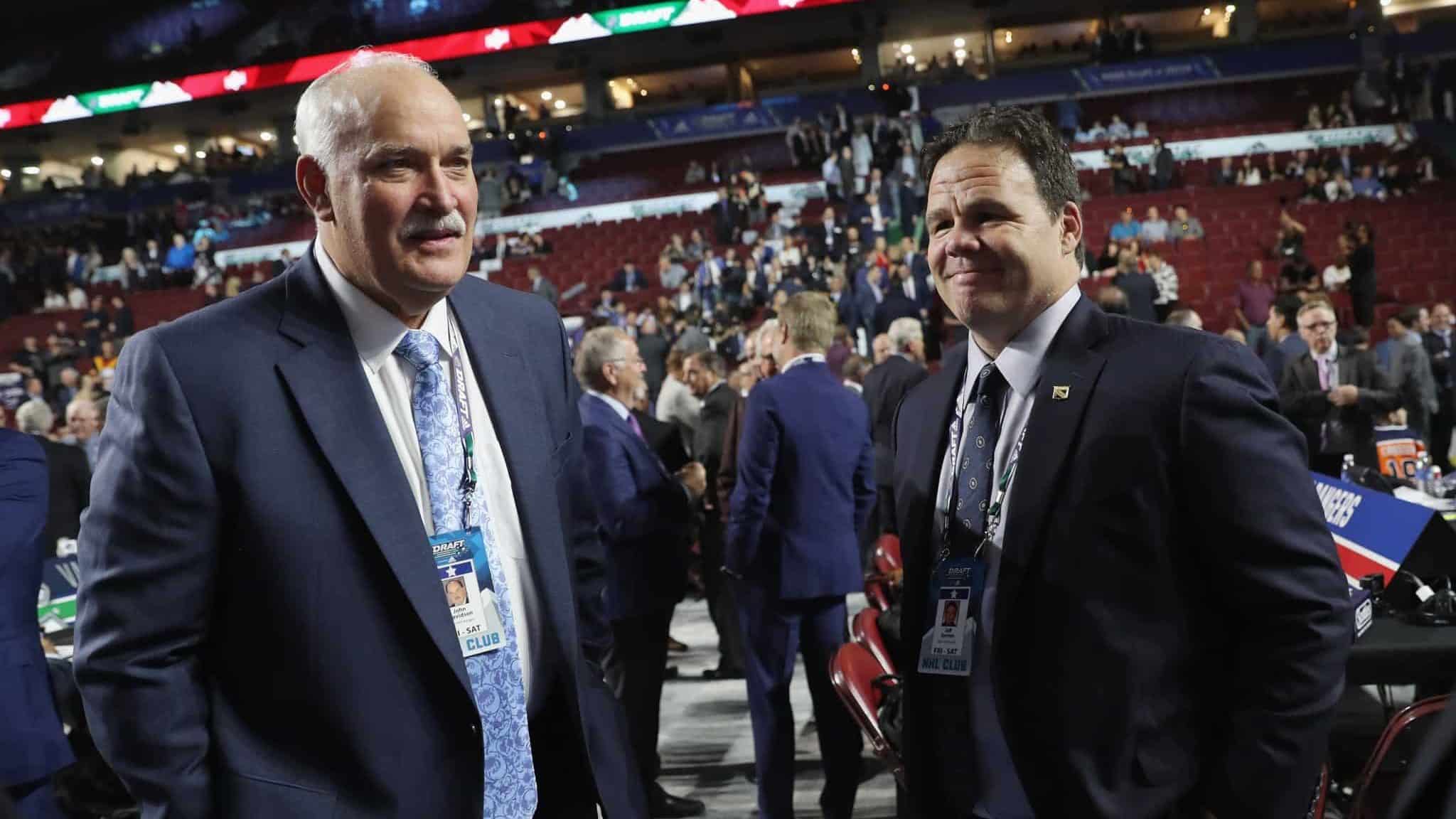 VANCOUVER, BRITISH COLUMBIA - JUNE 21: (L-R) John Davidson and Jeff Gorton of the New York Rangers attends the 2019 NHL Draft at the Rogers Arena on June 21, 2019 in Vancouver, Canada.