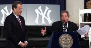 NEW YORK - NOVEMBER 06: New York Yankees broadcasters Michael Kay (L) and John Sterling speak during the New York Yankees World Series Victory Celebration at City Hall on November 6, 2009 in New York, New York.