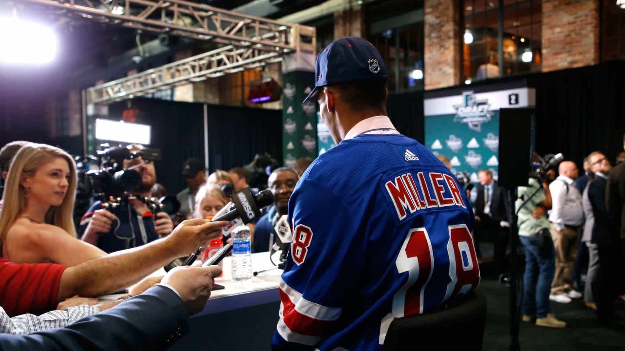 DALLAS, TX - JUNE 22: K'Andre Miller speaks to the media after being selected twenty-second overall by the New York Rangers during the first round of the 2018 NHL Draft at American Airlines Center on June 22, 2018 in Dallas, Texas.