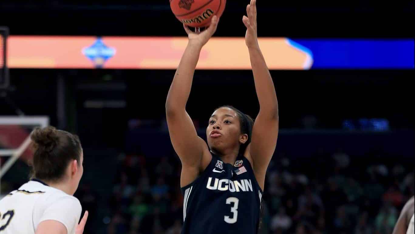 TAMPA, FLORIDA - APRIL 05: Megan Walker #3 of the UConn Huskies attempts a jump shot against the Notre Dame Fighting Irish during the third quarter in the semifinals of the 2019 NCAA Women's Final Four at Amalie Arena on April 05, 2019 in Tampa, Florida.