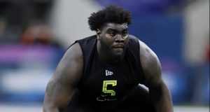 INDIANAPOLIS, IN - FEBRUARY 28: Offensive lineman Mekhi Becton of Louisville runs a drill during the NFL Combine at Lucas Oil Stadium on February 28, 2020 in Indianapolis, Indiana. New York Jets