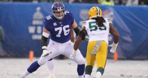 EAST RUTHERFORD, NEW JERSEY - DECEMBER 01: Nate Solder #76 of the New York Giants in action against Za'Darius Smith #55 of the Green Bay Packers during their game at MetLife Stadium on December 01, 2019 in East Rutherford, New Jersey.