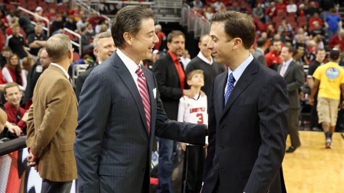 LOUISVILLE, KY - DECEMBER 19: Rick Pitino the head coach of the Louisville Cardinals and Richard Pitino the head coach of the Florida International Panthers meet before the game in the Billy Minardi Classic at KFC YUM! Center on December 19, 2012 in Louisville, Kentucky.
