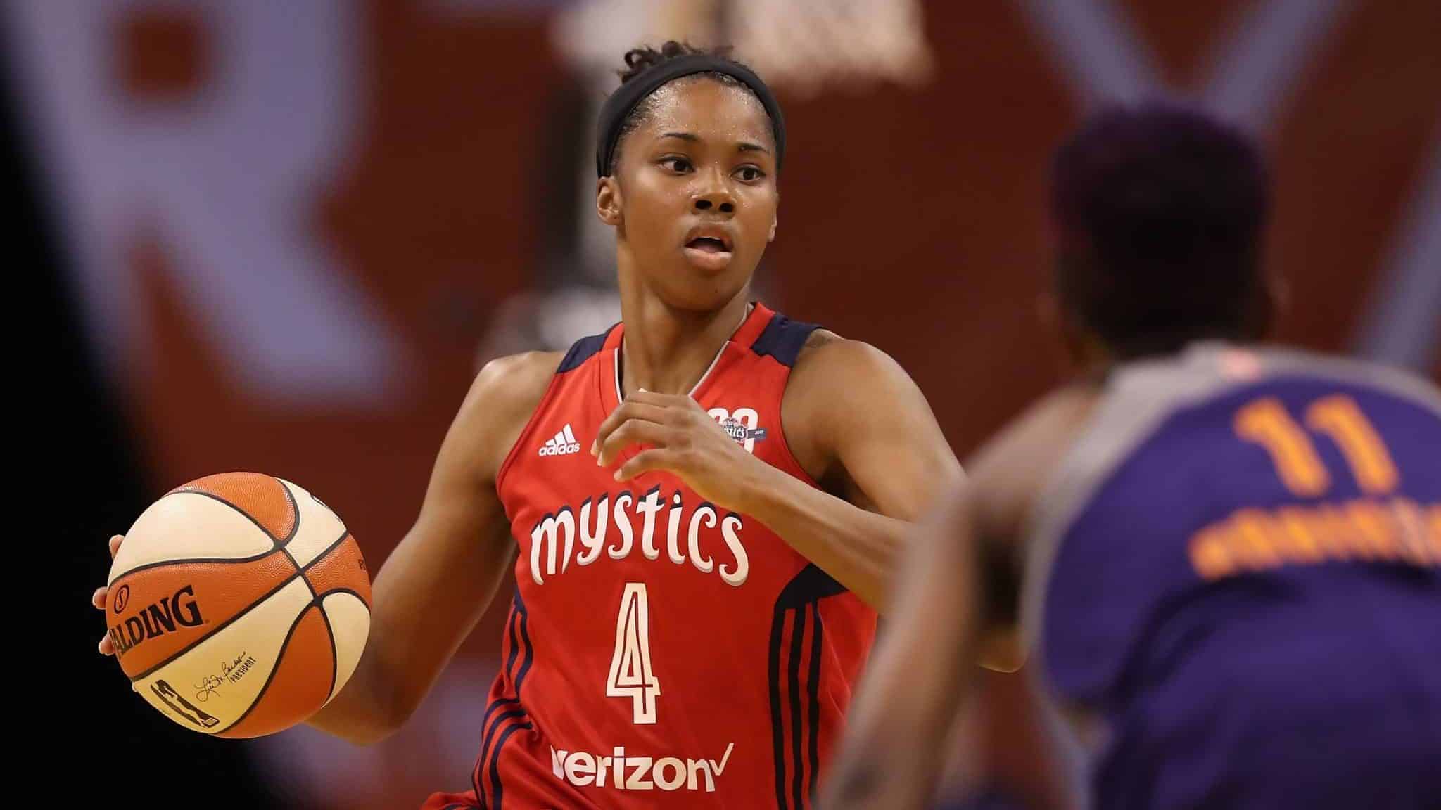 PHOENIX, AZ - JULY 05: Tayler Hill #4 of the Washington Mystics handles the ball during the WNBA game against the Phoenix Mercury at Talking Stick Resort Arena on July 5, 2017 in Phoenix, Arizona. NOTE TO USER: User expressly acknowledges and agrees that, by downloading and or using this photograph, User is consenting to the terms and conditions of the Getty Images License Agreement.