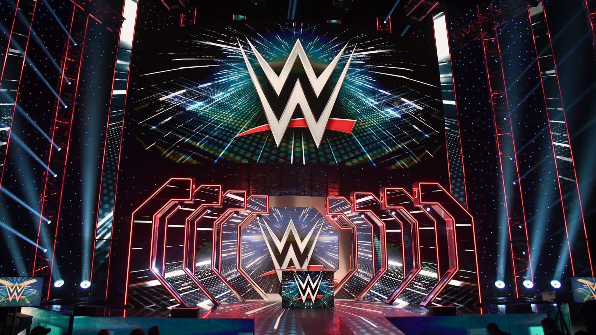 LAS VEGAS, NEVADA - OCTOBER 11: WWE logos are shown on screens before a WWE news conference at T-Mobile Arena on October 11, 2019 in Las Vegas, Nevada. It was announced that WWE wrestler Braun Strowman will face heavyweight boxer Tyson Fury and WWE champion Brock Lesnar will take on former UFC heavyweight champion Cain Velasquez at the WWE's Crown Jewel event at Fahd International Stadium in Riyadh, Saudi Arabia on October 31.