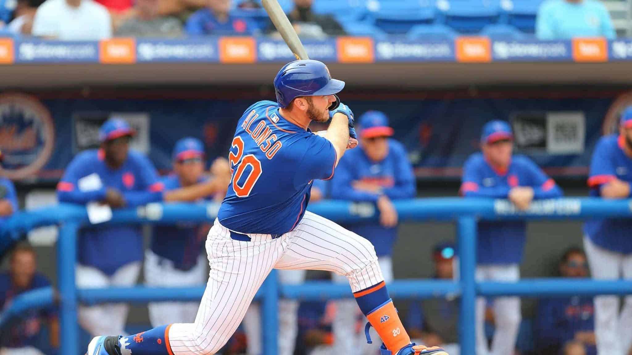 PORT ST. LUCIE, FL - MARCH 08: Pete Alonso #20 of the New York Mets hits an RBI double against the Houston Astros during the fifth inning of a spring training baseball game at Clover Park on March 8, 2020 in Port St. Lucie, Florida. The Mets defeated the Astros 3-1.