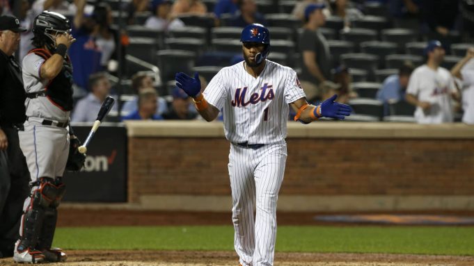 NEW YORK, NEW YORK - SEPTEMBER 23: Amed Rosario #1 of the New York Mets reacts after his sixth inning grand slam home run against the Miami Marlins at Citi Field on September 23, 2019 in New York City.