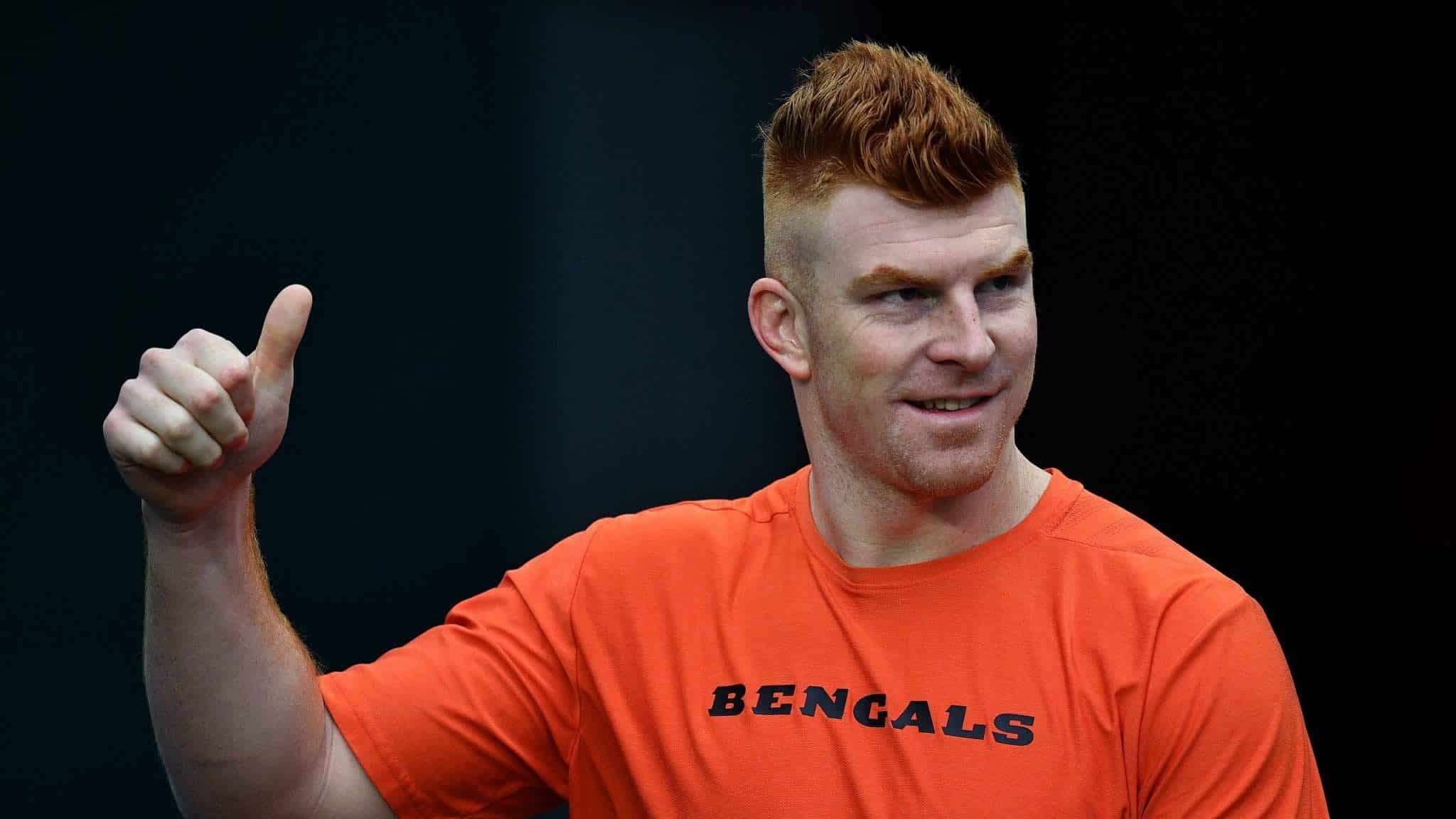 MIAMI, FLORIDA - DECEMBER 22: Andy Dalton #14 of the Cincinnati Bengals gestures to the fans prior to the game against the Miami Dolphins at Hard Rock Stadium on December 22, 2019 in Miami, Florida.