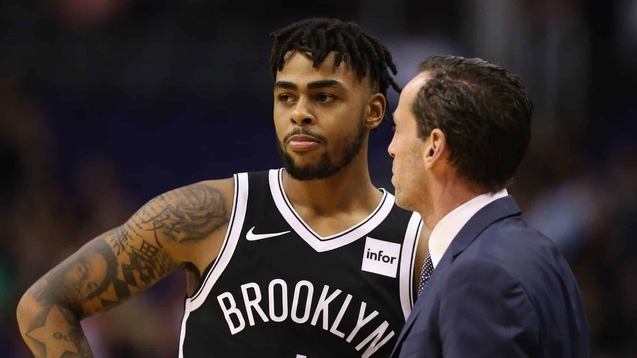 PHOENIX, AZ - NOVEMBER 06: D'Angelo Russell #1 and head coach Kenny Atkinson of the Brooklyn Nets during the NBA game against the Phoenix Suns at Talking Stick Resort Arena on November 6, 2017 in Phoenix, Arizona. The Nets defeated the Suns 98-92. NOTE TO USER: User expressly acknowledges and agrees that, by downloading and or using this photograph, User is consenting to the terms and conditions of the Getty Images License Agreement.