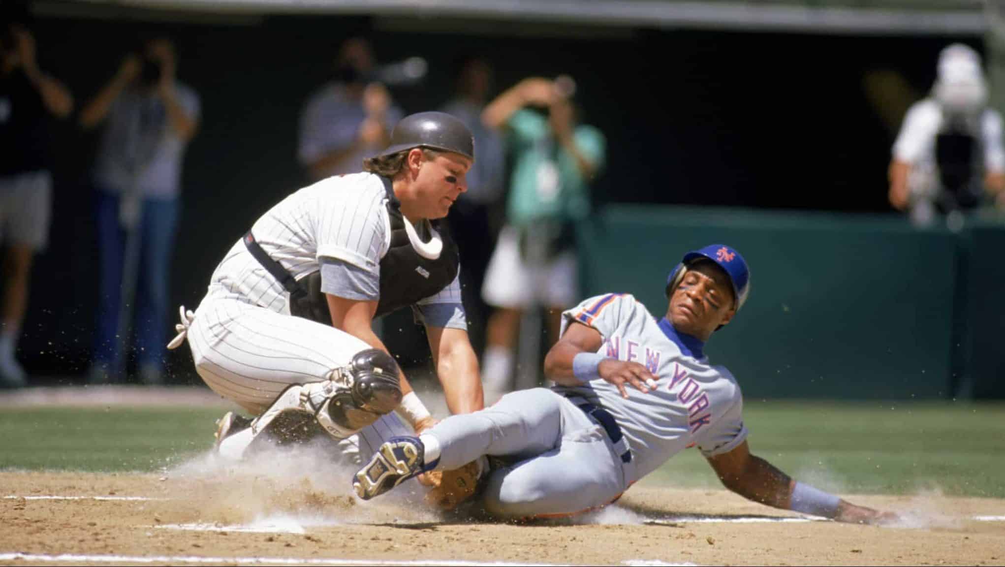 1989: Darryl Strawberry of the New York Mets slides into home during a game in the 1989 season against the San Diego Padres.