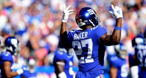 EAST RUTHERFORD, NEW JERSEY - SEPTEMBER 29: Deandre Baker #27 of the New York Giants reacts during their game against the Washington Redskins at MetLife Stadium on September 29, 2019 in East Rutherford, New Jersey.