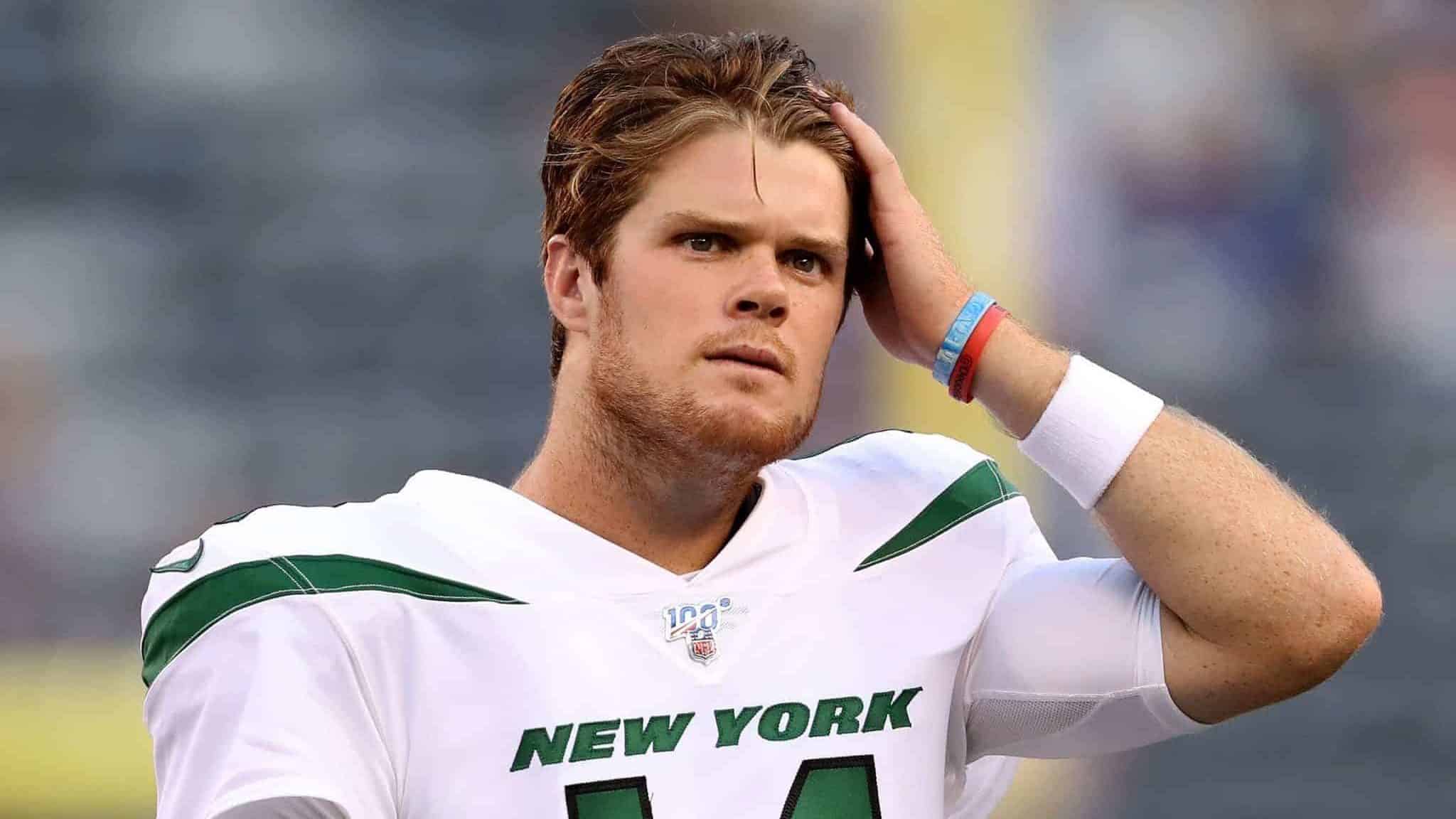 EAST RUTHERFORD, NEW JERSEY - AUGUST 08: Sam Darnold #14 of the New York Jets warms up before the game against the New York Giants during a preseason matchup at MetLife Stadium on August 08, 2019 in East Rutherford, New Jersey.