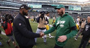 EAST RUTHERFORD, NEW JERSEY - DECEMBER 22: Head coach Mike Tomlin of the Pittsburgh Steelers meets head coach Adam Gase of the New York Jets after the Jets 16-10 win at MetLife Stadium on December 22, 2019 in East Rutherford, New Jersey.