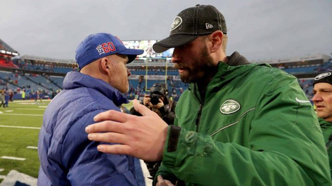 ORCHARD PARK, NEW YORK - DECEMBER 29: Head Coach Sean McDermott of the Buffalo Bills and head coach Adam Gase of the New York Jets embrace after an NFL game at New Era Field on December 29, 2019 in Orchard Park, New York.