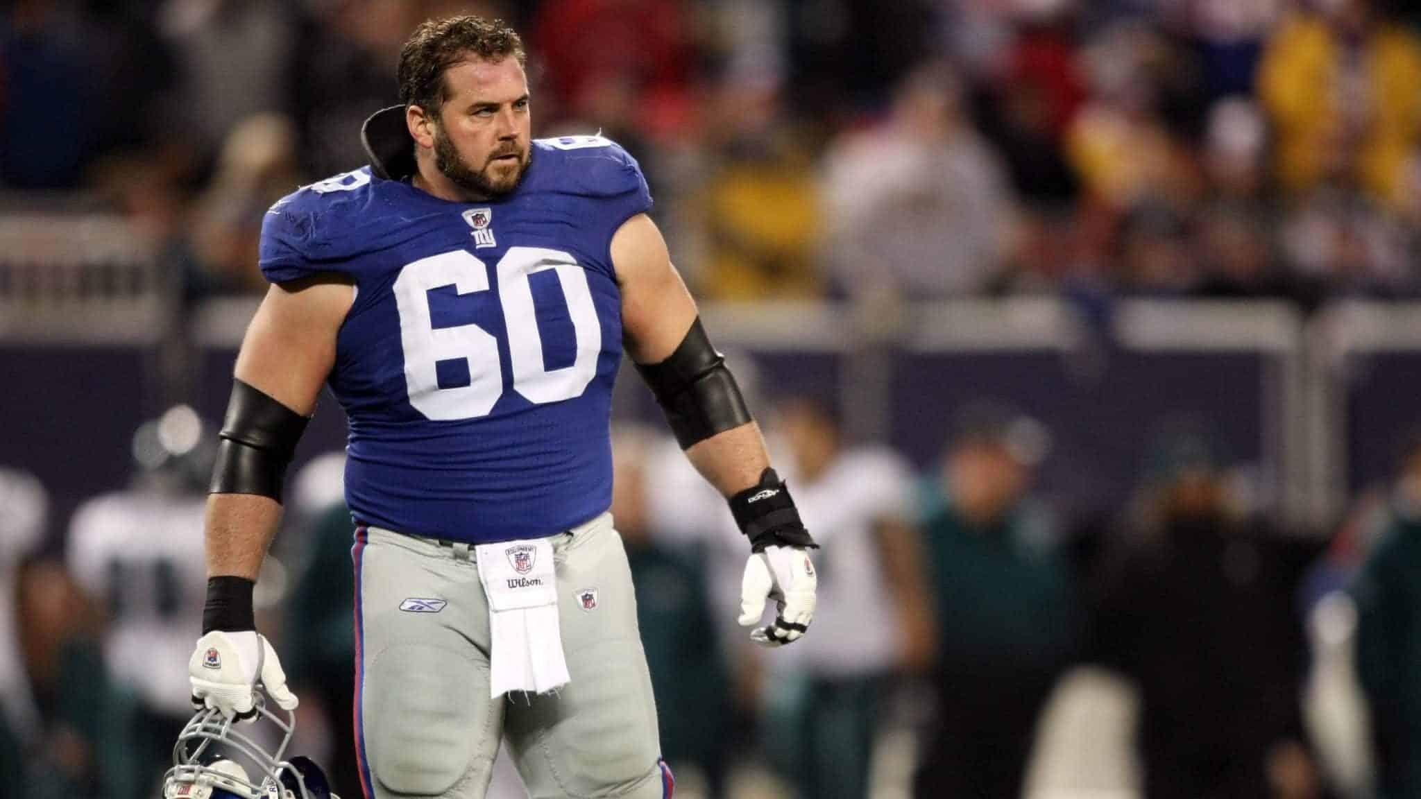 EAST RUTHERFORD, NJ - DECEMBER 13: Shaun O'Hara #60 of the New York Giants looks on against the Philadelphia Eagles at Giants Stadium on December 13, 2009 in East Rutherford, New Jersey.