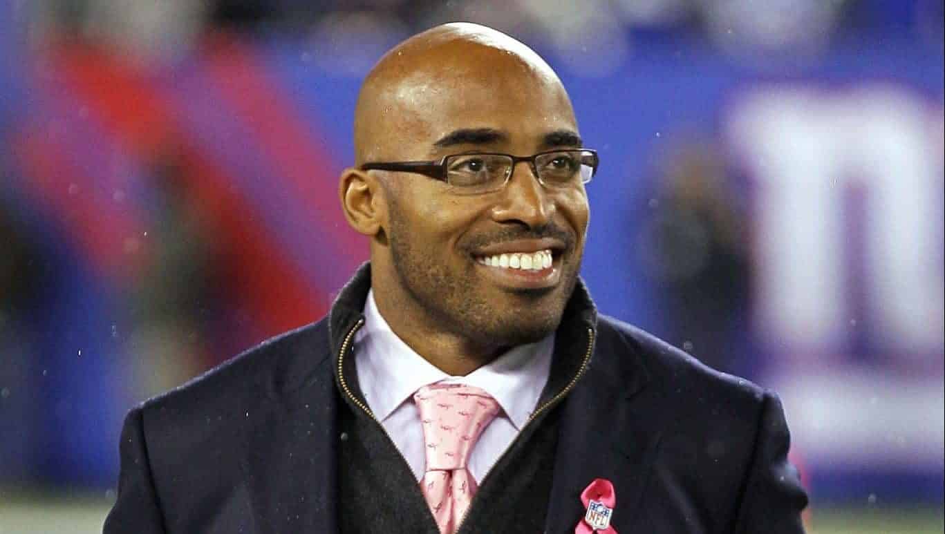EAST RUTHERFORD, NJ - OCTOBER 03: Former New York Giants Tiki Barber is inducted into the Giants �Ring of Honor� during halftime of a game between the Chicago Bears and the New York Giants at New Meadowlands Stadium on October 3, 2010 in East Rutherford, New Jersey.