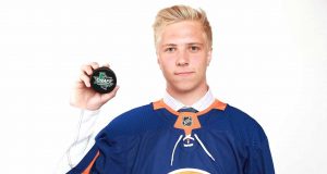 DALLAS, TX - JUNE 23: Blade Jenkins poses after being selected 134th overall by the New York Islanders during the 2018 NHL Draft at American Airlines Center on June 23, 2018 in Dallas, Texas.
