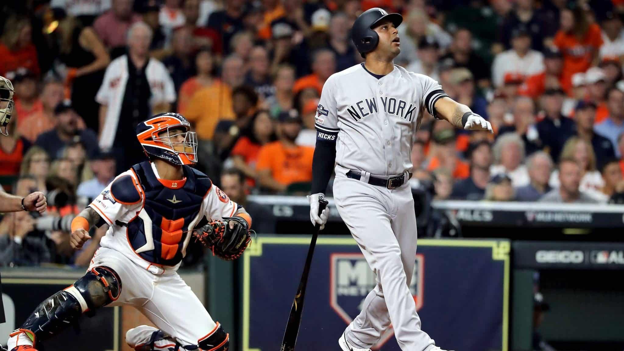 HOUSTON, TEXAS - OCTOBER 19: Aaron Hicks #31 of the New York Yankees flies out against the Houston Astros during the third inning in game six of the American League Championship Series at Minute Maid Park on October 19, 2019 in Houston, Texas.
