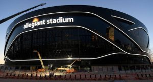 LAS VEGAS, NEVADA - APRIL 23: Crews test out architectural light ribbons and exterior sign lighting as construction continues at Allegiant Stadium, the USD 2 billion, glass-domed future home of the Las Vegas Raiders on April 23, 2020 in Las Vegas, Nevada. The Raiders and the UNLV Rebels football teams are scheduled to begin play at the 65,000-seat facility in their 2020 seasons.