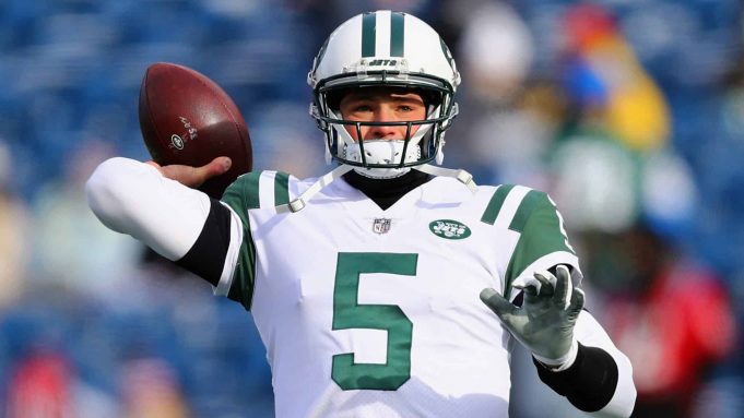 FOXBORO, MA - DECEMBER 31: Christian Hackenberg #5 of the New York Jets warms up before the game against the New England Patriots at Gillette Stadium on December 31, 2017 in Foxboro, Massachusetts.