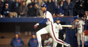 FLUSHING, NY - OCTOBER 27: Right fielder Darryl Strawberry #18 of the New York Mets swings during game 7 of the 1986 World Series against the Boston Red Sox at Shea Stadium on October 27, 1986 in Flushing, New York. The Mets won the series 4-3.