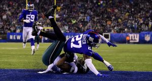 EAST RUTHERFORD, NEW JERSEY - DECEMBER 29: Josh Perkins #81 of the Philadelphia Eagles catches a 24 yard touchdown pass against Deandre Baker #27 of the New York Giants during the second quarter in the game at MetLife Stadium on December 29, 2019 in East Rutherford, New Jersey.