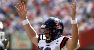 Ole Miss quarterback Eli Manning signals a game-ending touchdown Saturday, October 4, 2003 at Ben Hill Griffin Stadium, Gainesville. Old Miss upset the Gators 20 - 17.
