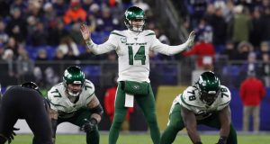 BALTIMORE, MARYLAND - DECEMBER 12: Quarterback Sam Darnold #14 of the New York Jets signals at the line of scrimmage during the second quarter against the Baltimore Ravens at M&T Bank Stadium on December 12, 2019 in Baltimore, Maryland.