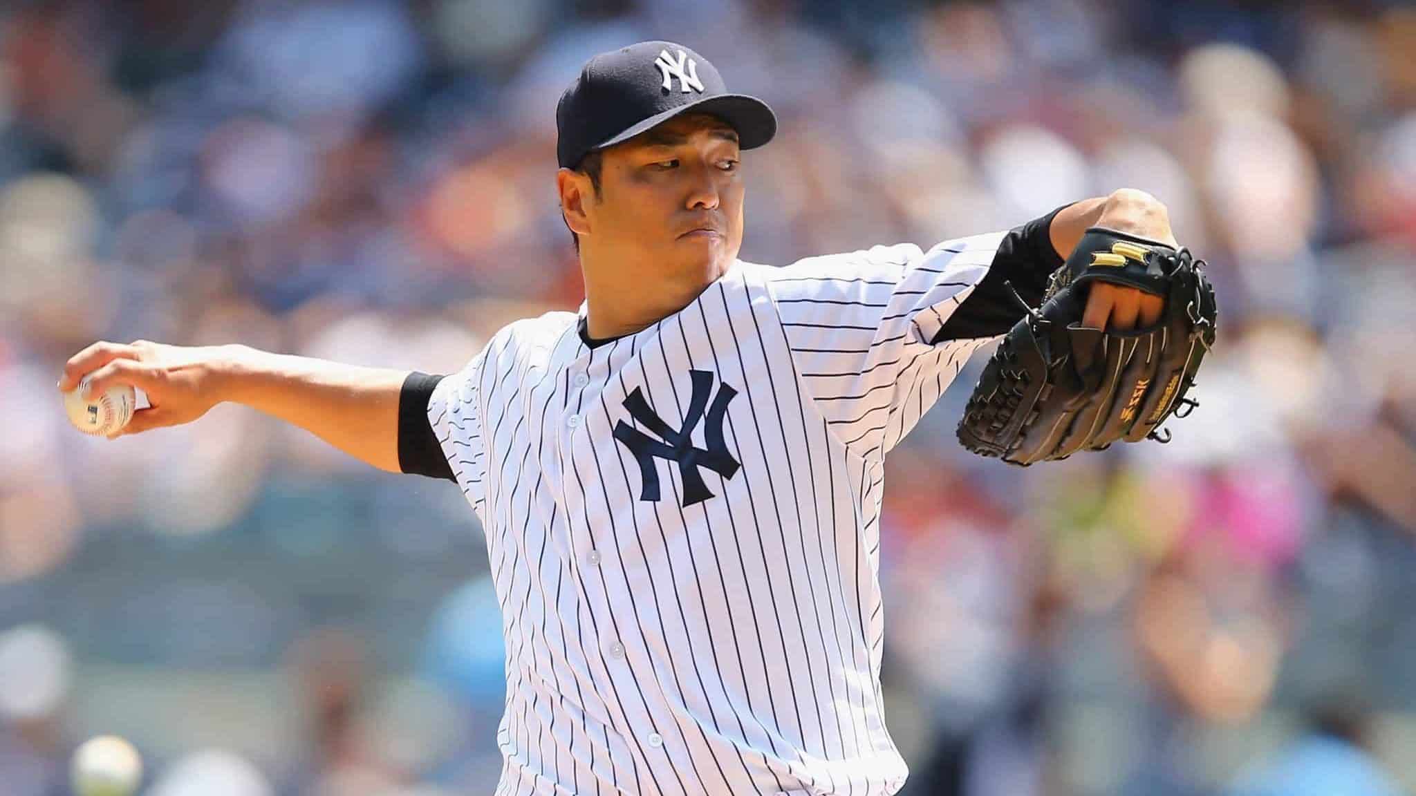 NEW YORK, NY - AUGUST 10: Hiroki Kuroda #18 of the New York Yankees pitches against the Cleveland Indians during their game at Yankee Stadium on August 10, 2014 in the Bronx borough of New York City.