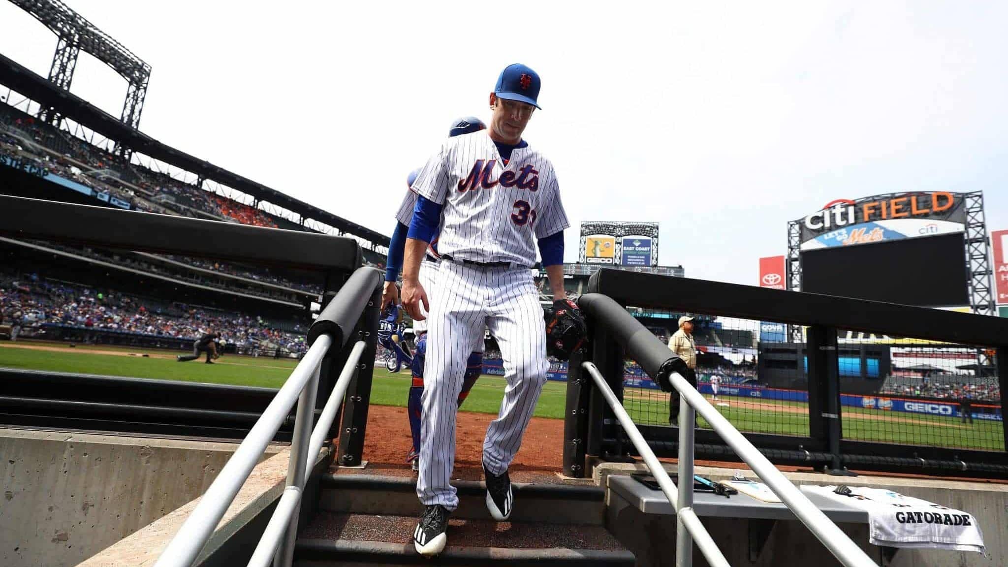 NEW YORK, NY - APRIL 27: Matt Harvey #33 of the New York Mets enters the dugout after the third inning against the Atlanta Braves during their game at Citi Field on April 27, 2017 in New York City.