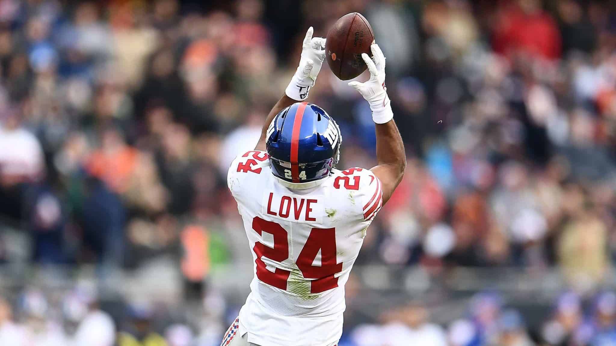 CHICAGO, ILLINOIS - NOVEMBER 24: Julian Love #24 of the New York Giants intercepts a pass during the second half of a game against the Chicago Bears at Soldier Field on November 24, 2019 in Chicago, Illinois.