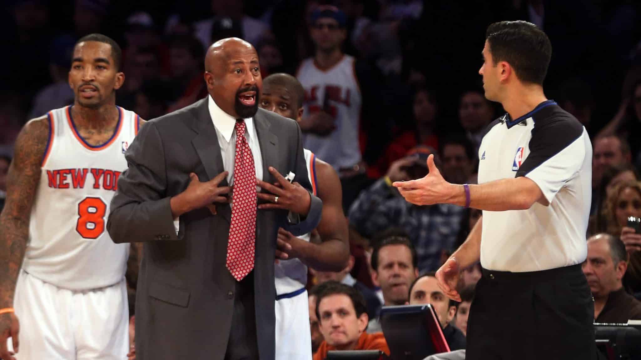 NEW YORK, NY - DECEMBER 21: Head coach Mike Woodson of the New York Knicks argues a call in the game against the Chicago Bulls at Madison Square Garden on December 21, 2012 in New York City. NOTE TO USER: User expressly acknowledges and agrees that, by downloading and/or using this photograph, user is consenting to the terms and conditions of the Getty Images License Agreement.