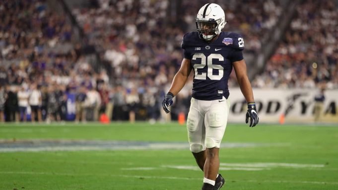 GLENDALE, AZ - DECEMBER 30: Running back Saquon Barkley #26 of the Penn State Nittany Lions walks on the field during the second half of the Playstation Fiesta Bowl against the Washington Huskies at University of Phoenix Stadium on December 30, 2017 in Glendale, Arizona. The Nittany Lions defeated the Huskies 35-28.